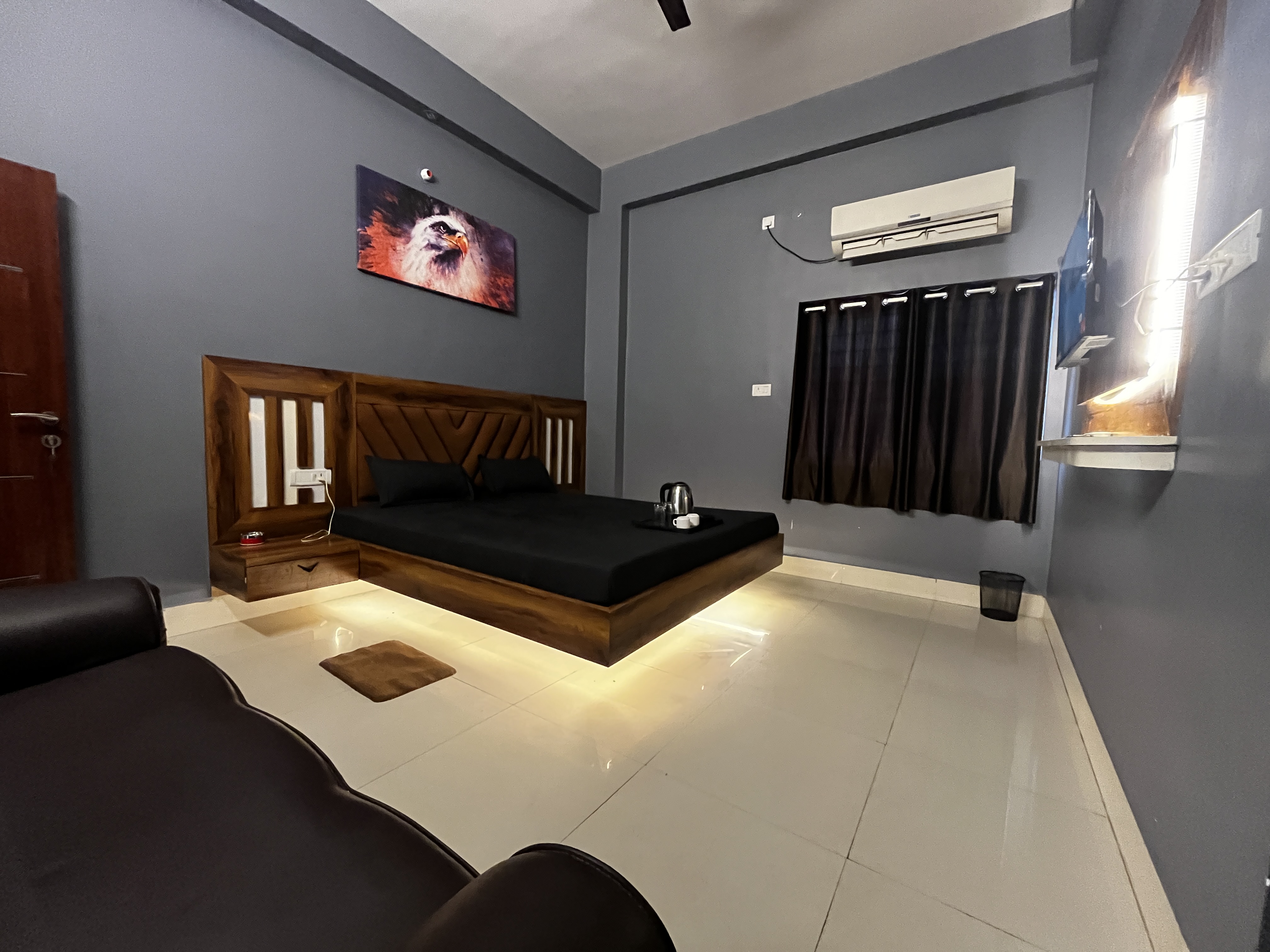 Dark Room room at Roomssolution Hotel Patna
